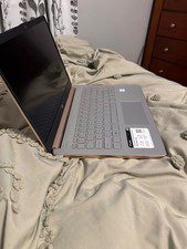 HP laptop rose pink. Bought in November. Practically brand new. Hardly used